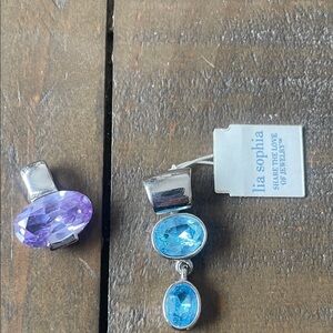 Lia Sophia NEW Silver pendants one with Purple one Blue .  Stunning!!!!